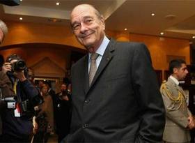 chirac_sonrie_anoche_inicio_24_cumbre_jefes_estado_africanos_francia_cannes.jpg